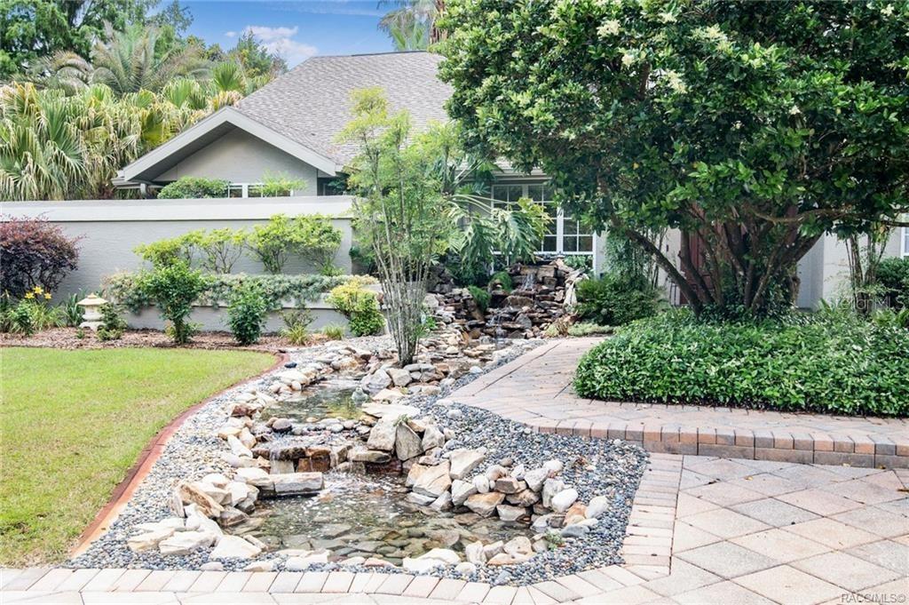 a view of a garden with a patio