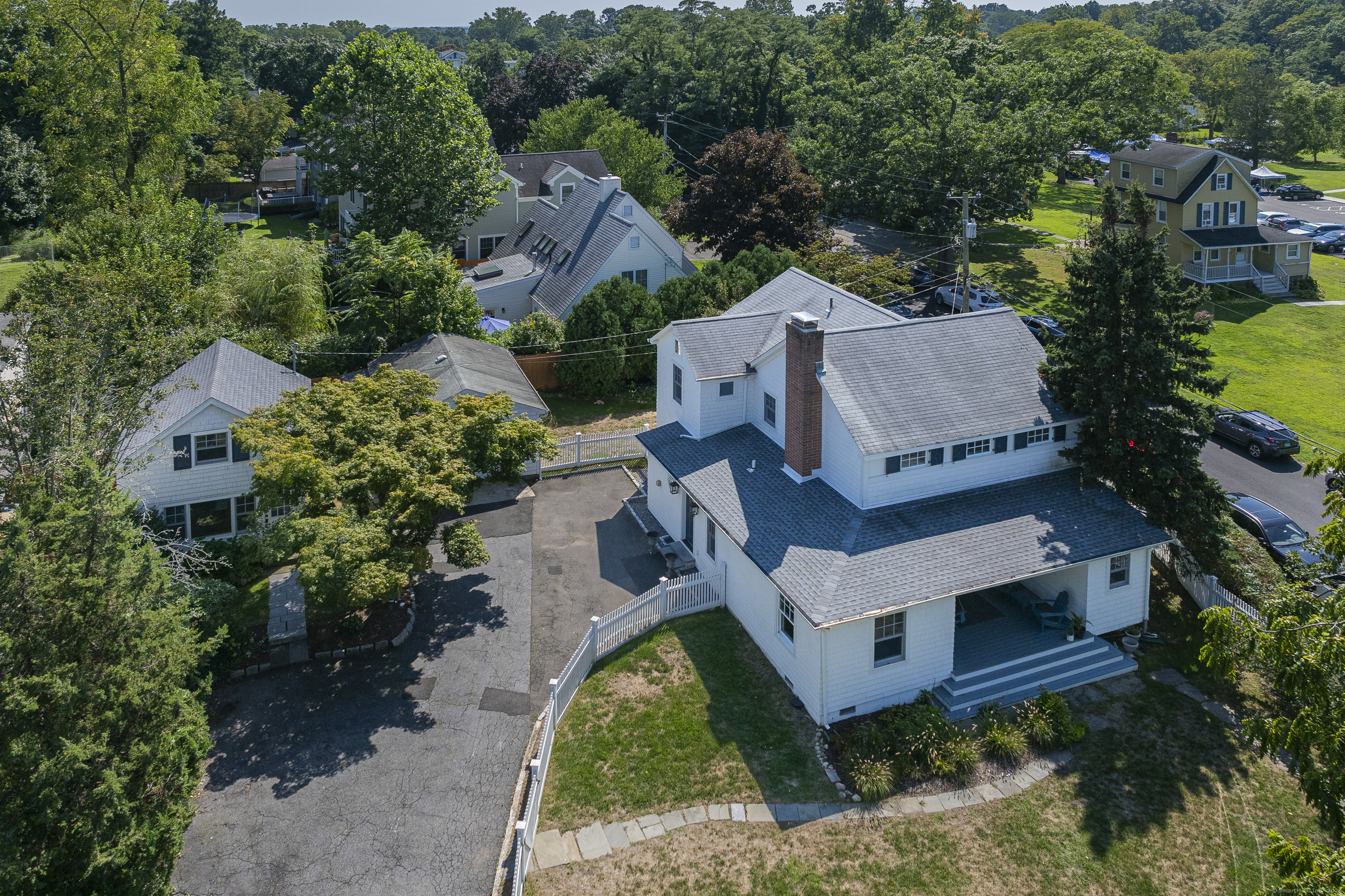 an aerial view of a house with a garden