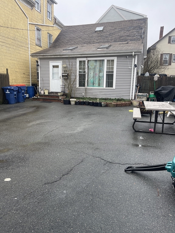 front view of a house with a patio