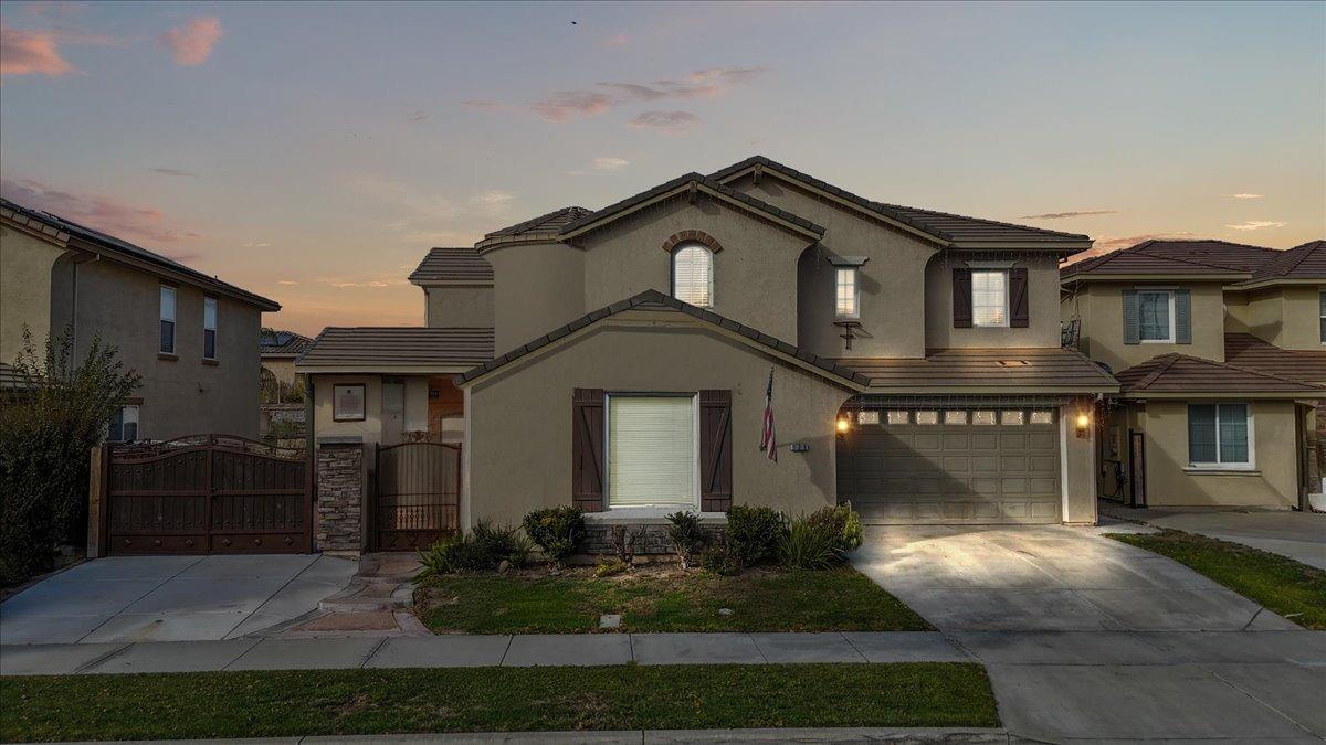 a front view of a house with entertaining space