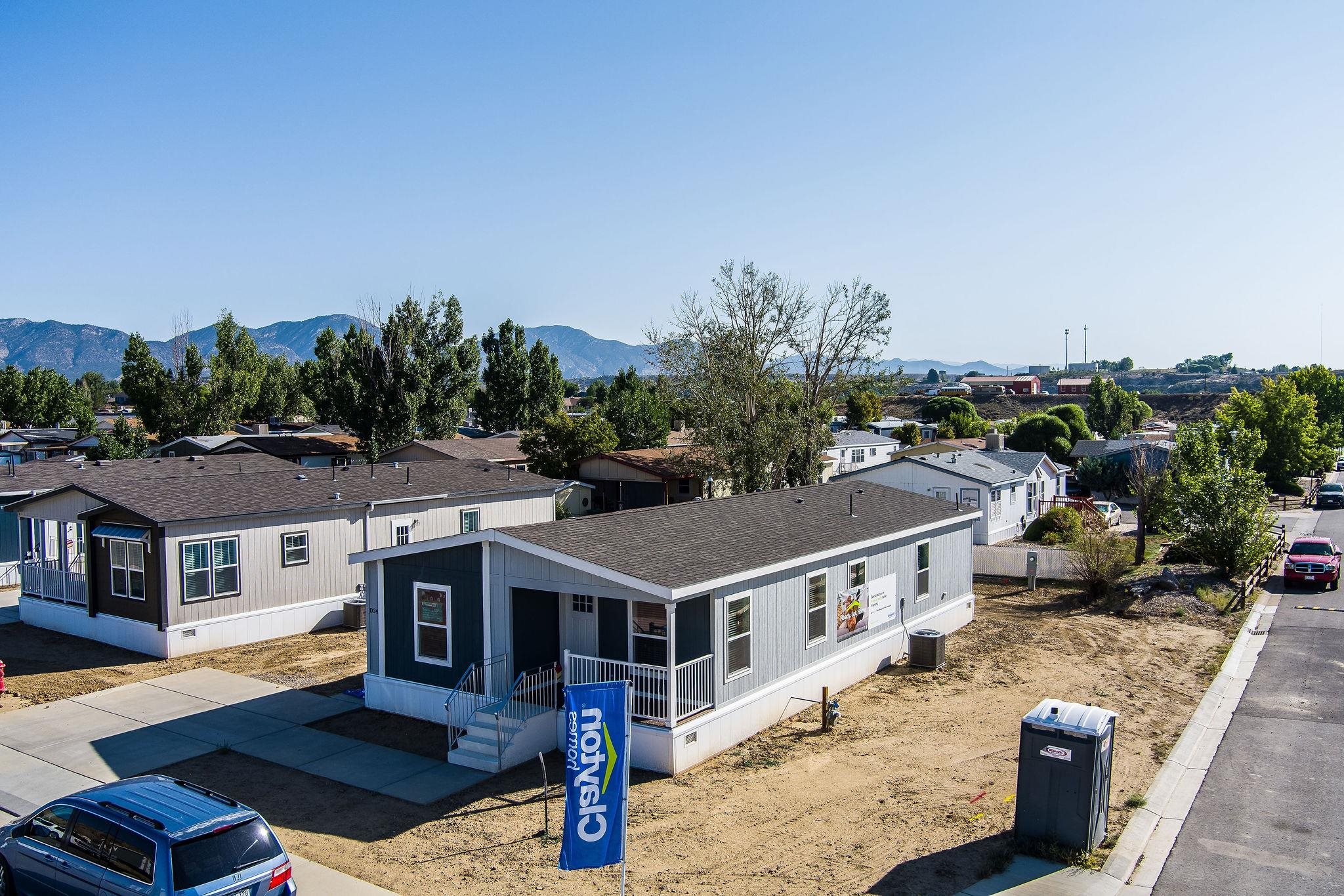 an aerial view of a house with a big yard