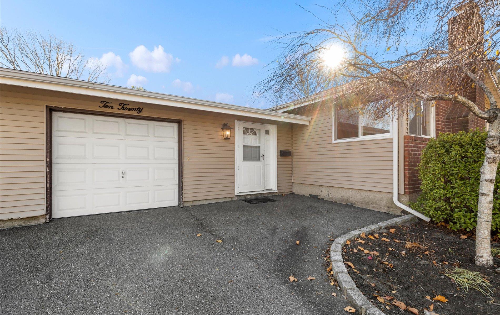 View of front facade with a garage