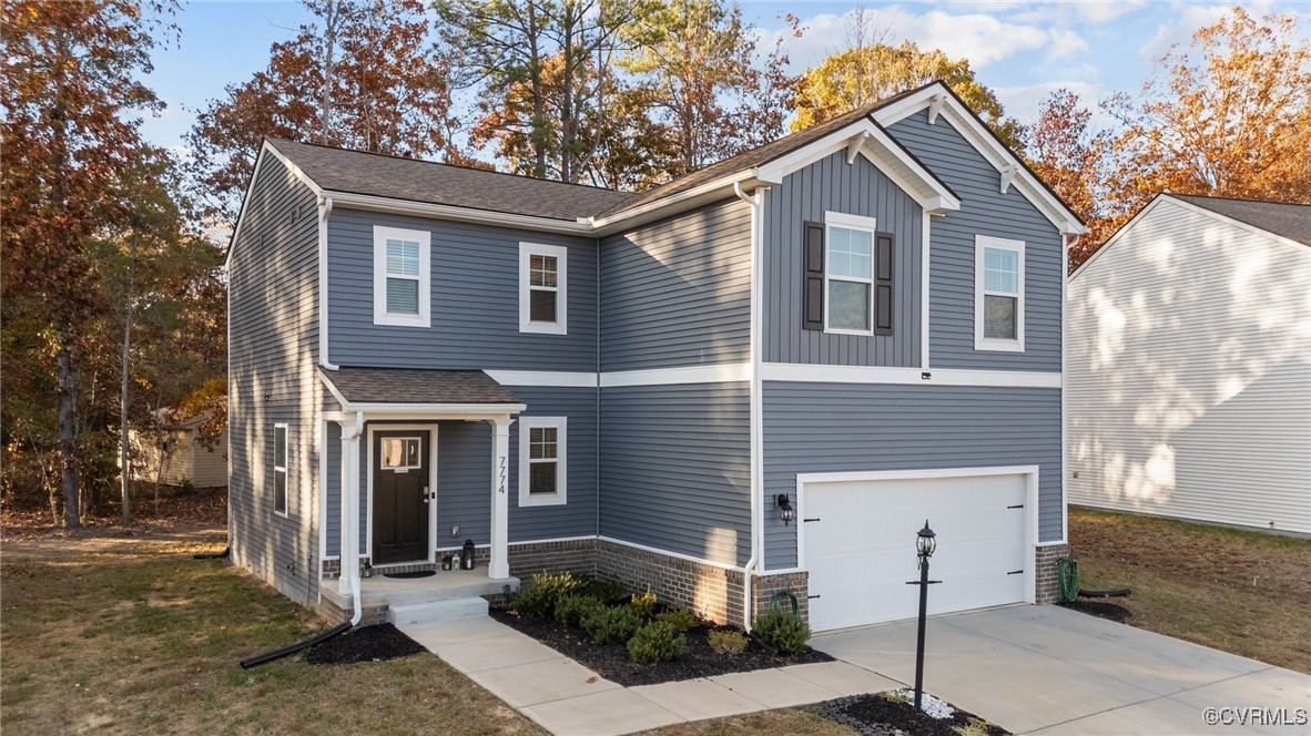 a front view of a house with yard