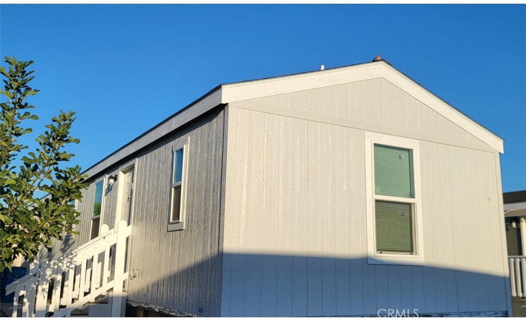 a view of outdoor space and front view of a house