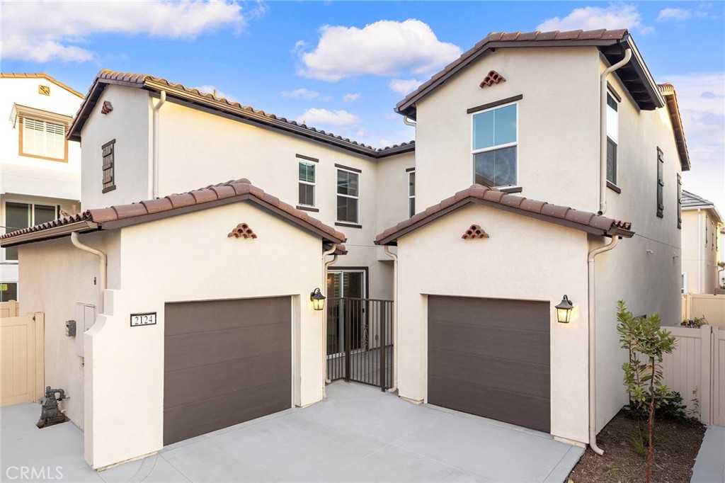 a view of a house with a garage