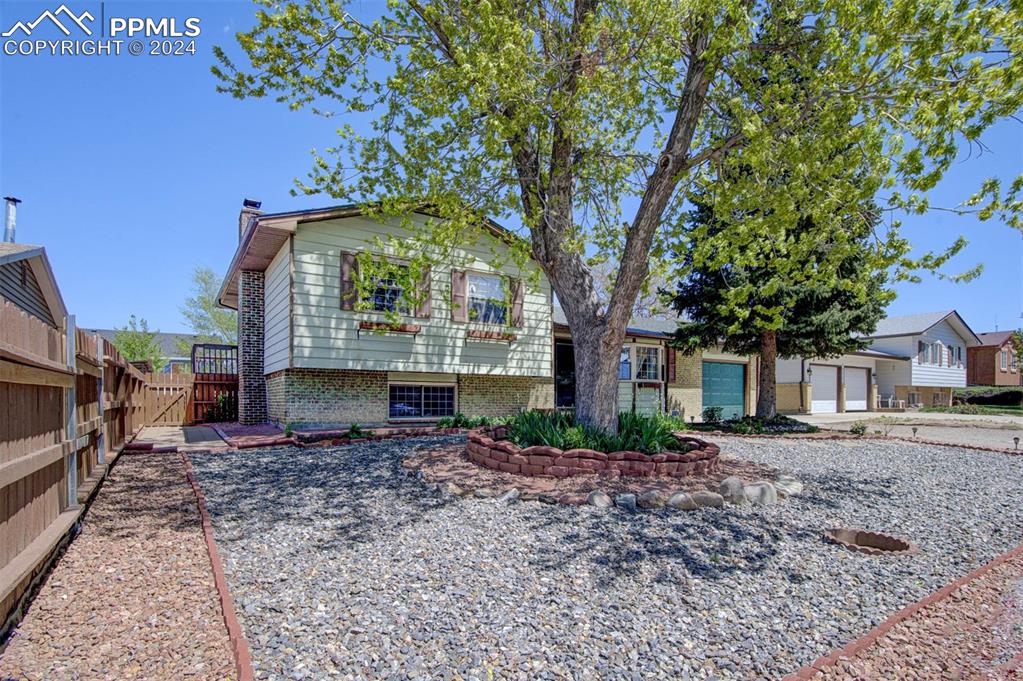 Another view of this lovely Tri-level home featuring a 1 car oversized garage