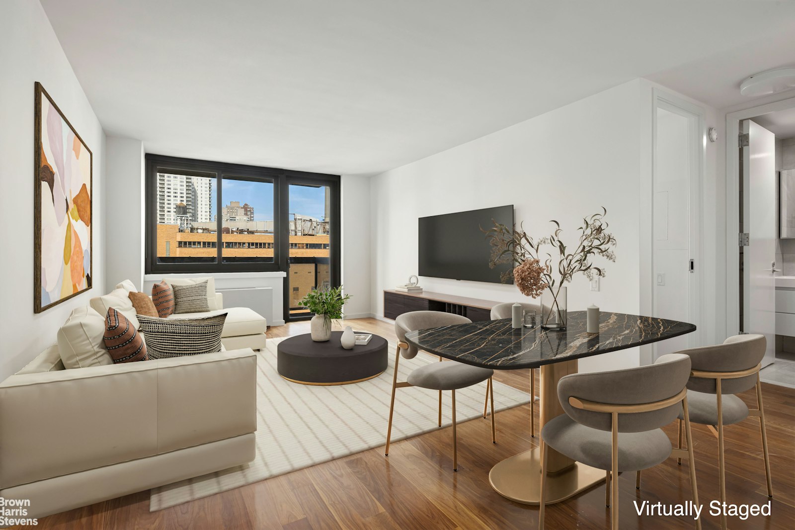 a living room with furniture and a flat screen tv