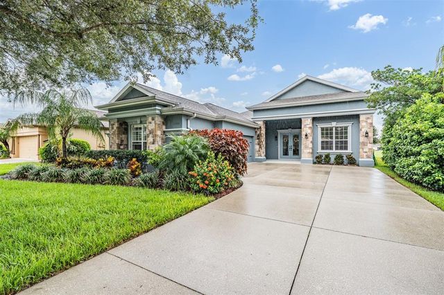 $650,000 | 13330 Trailing Moss Drive | Lake Jovita Golf and Country Club