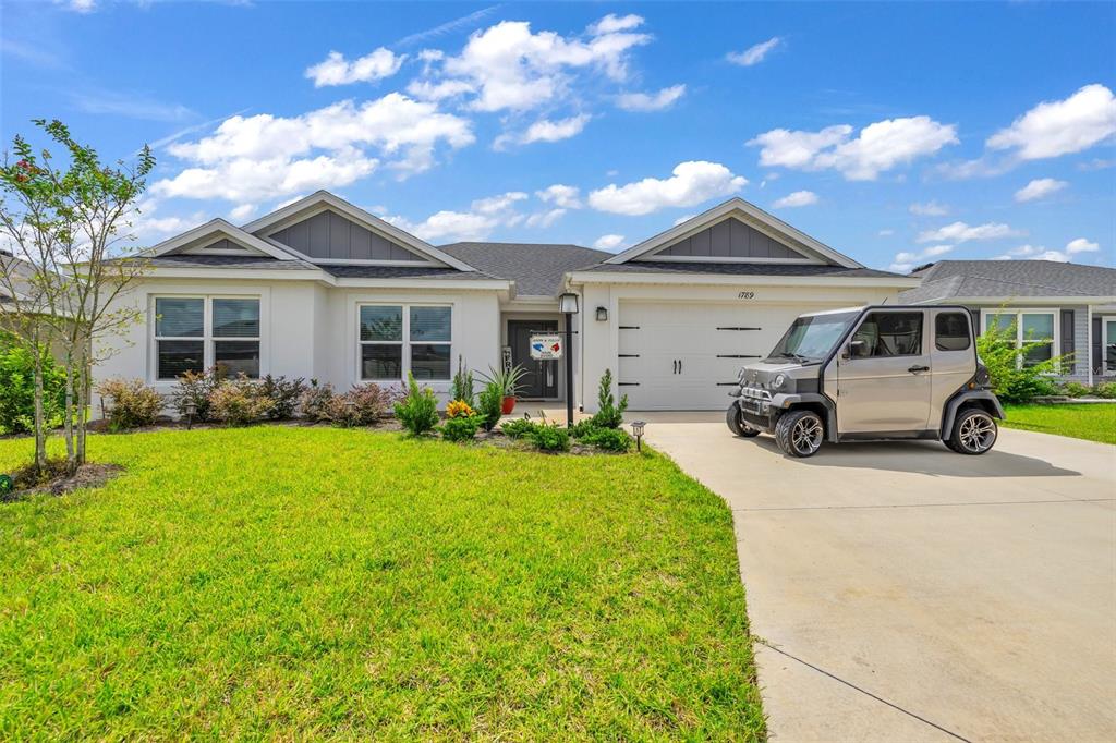 a house view with a garden space