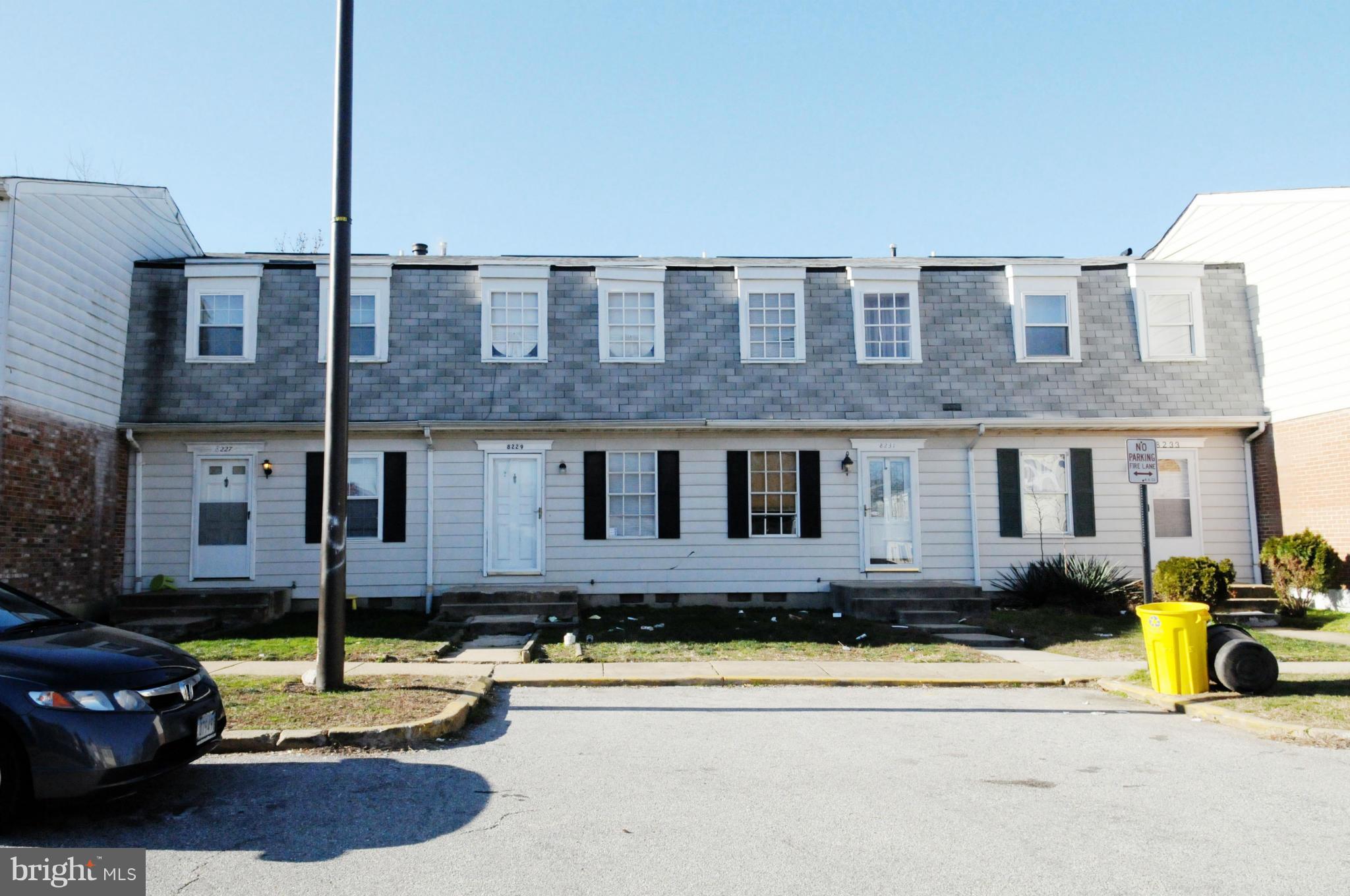 a front view of a house with swimming pool