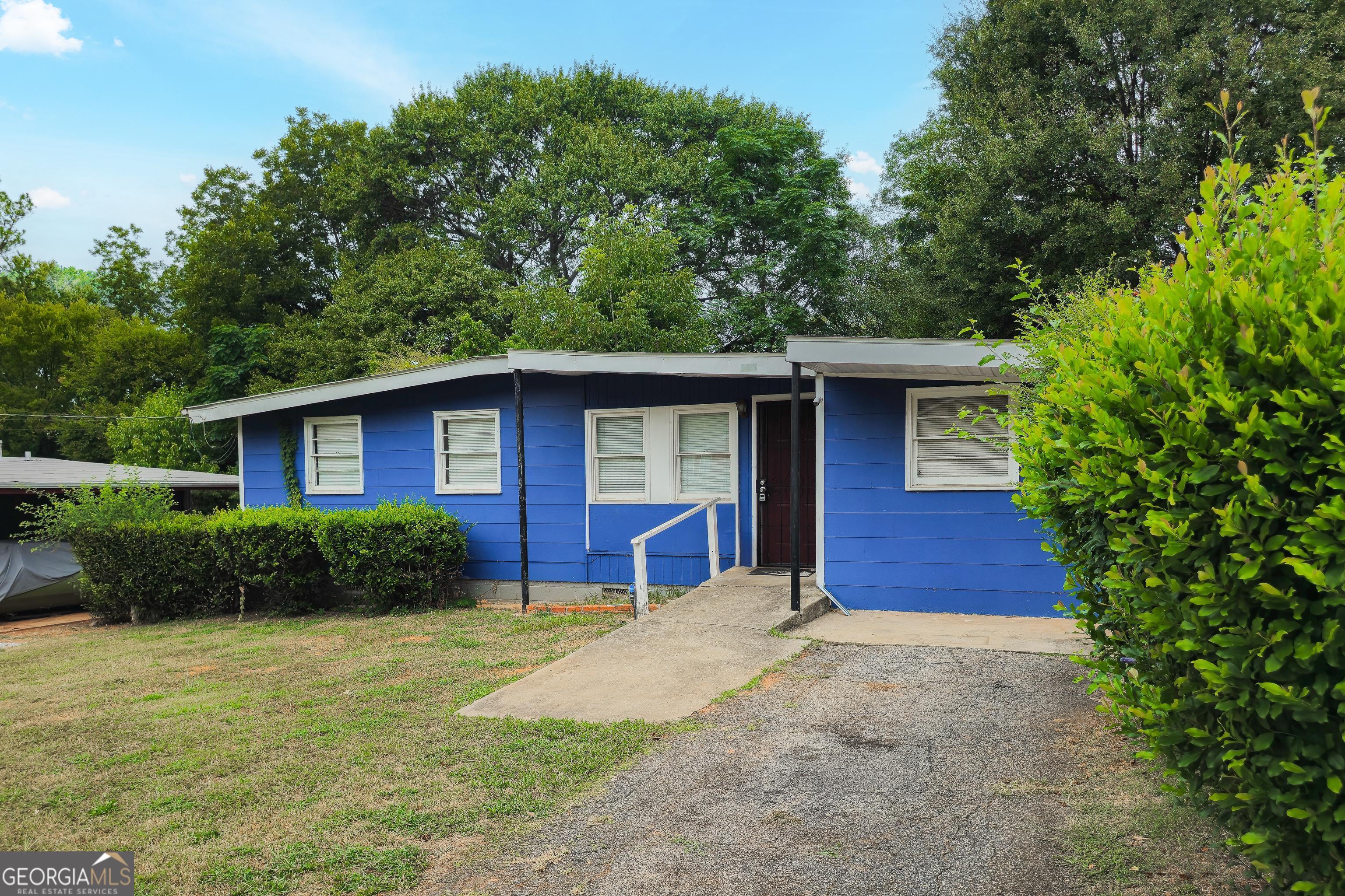 a view of a house with garden