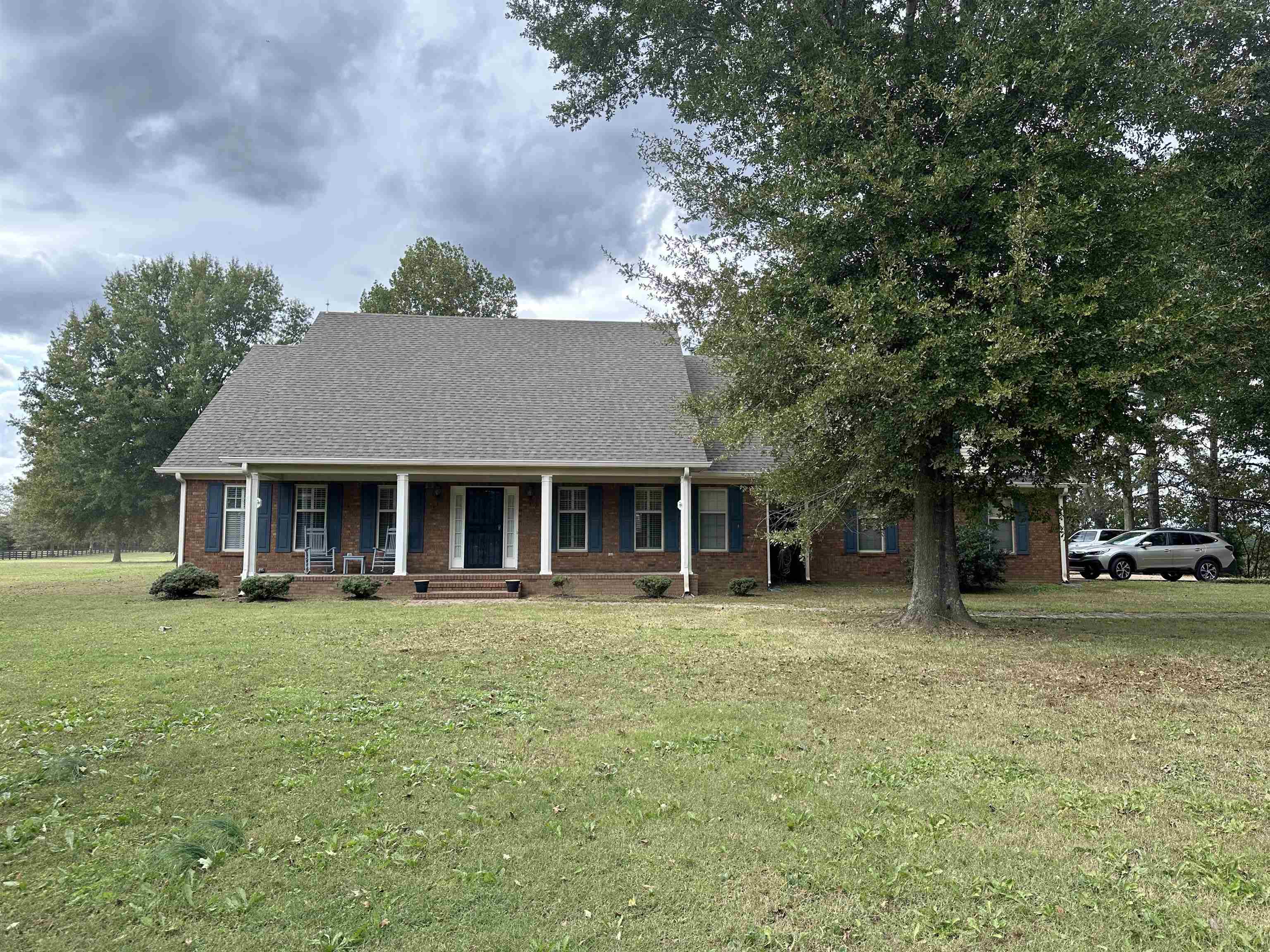 front view of a house with a garden