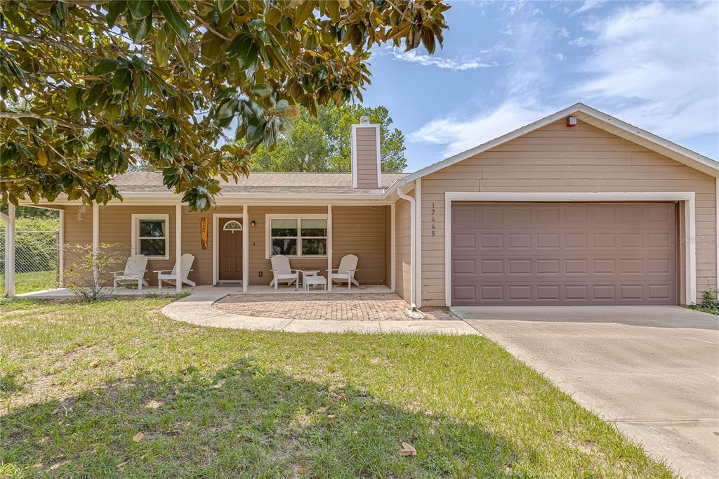 front view of house with a yard