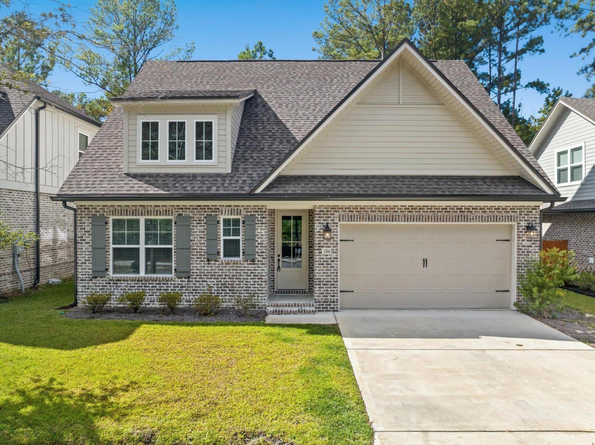 a front view of house with yard