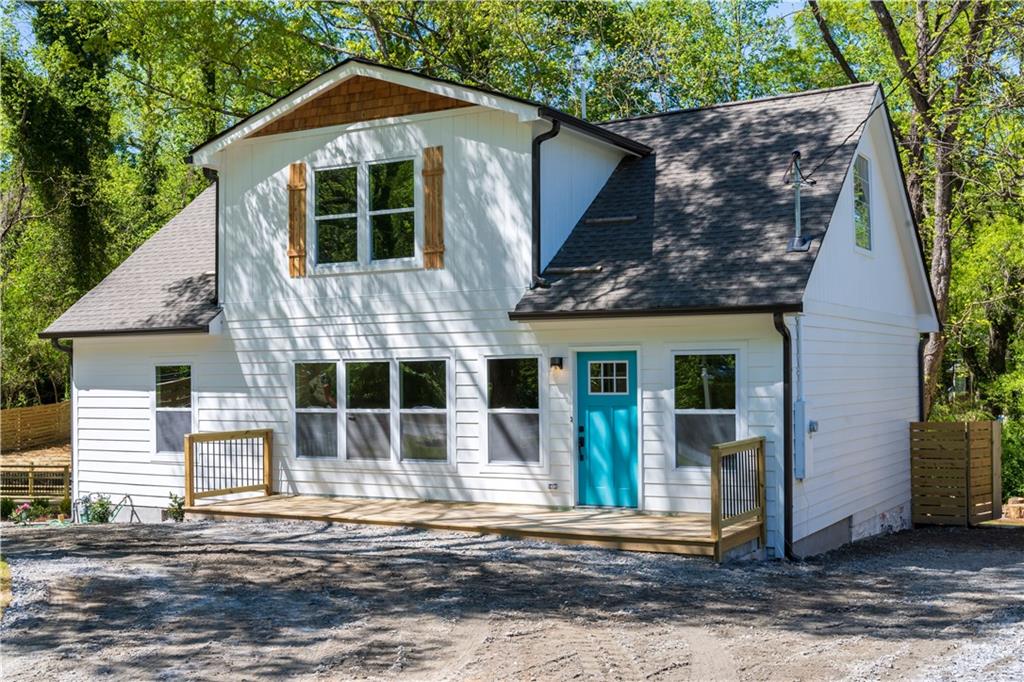 a front view of a house with a garage