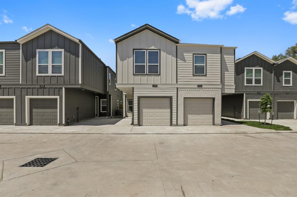 a front view of a house with a garage