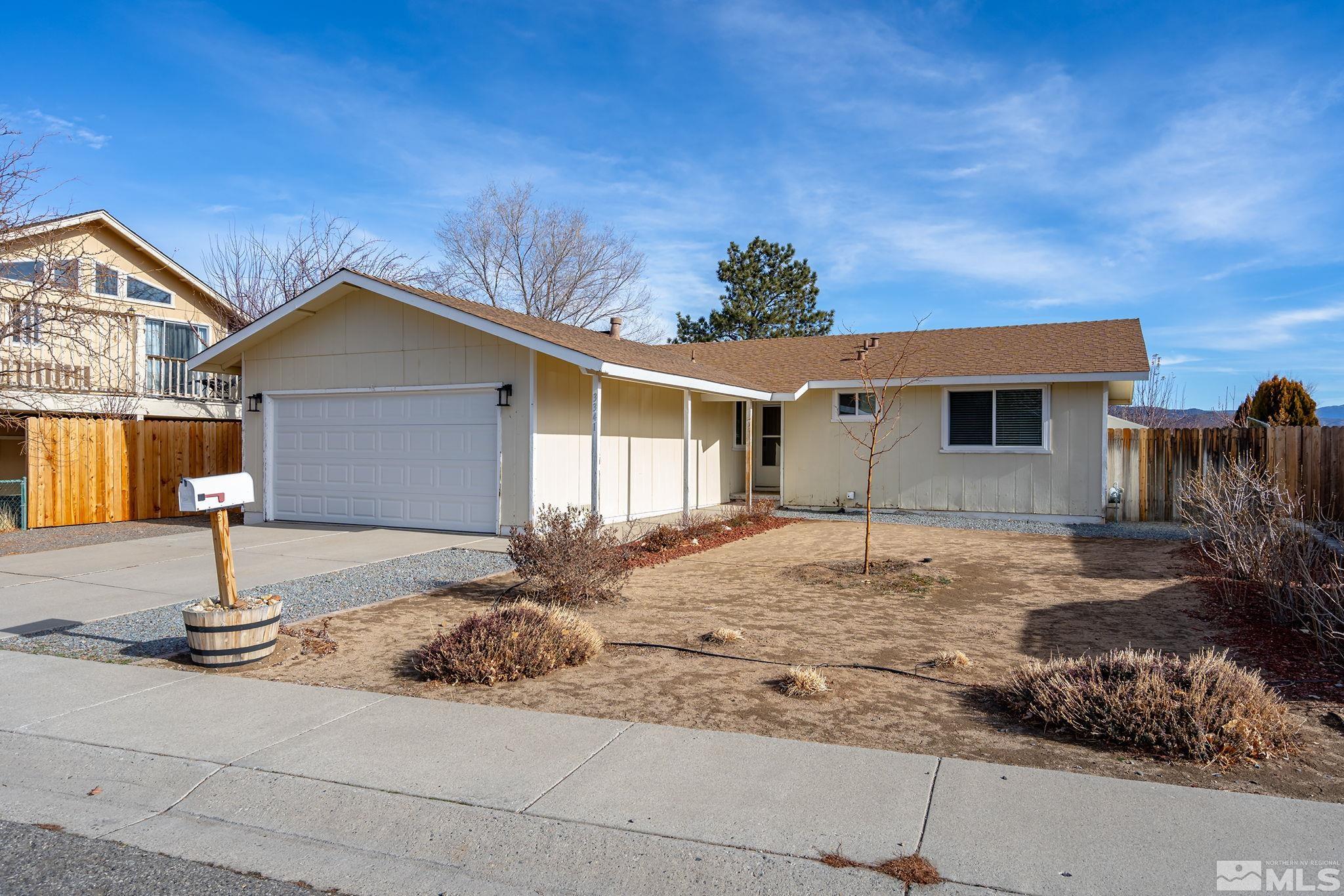 a house with yard in front of it