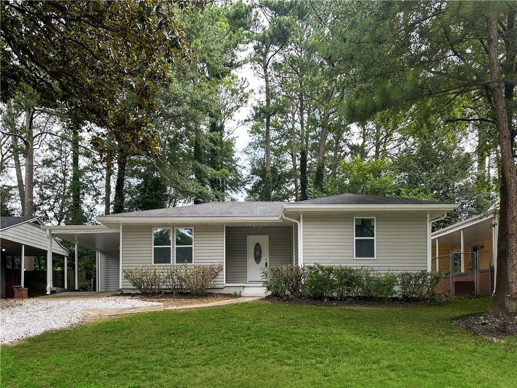 front view of a house and a yard