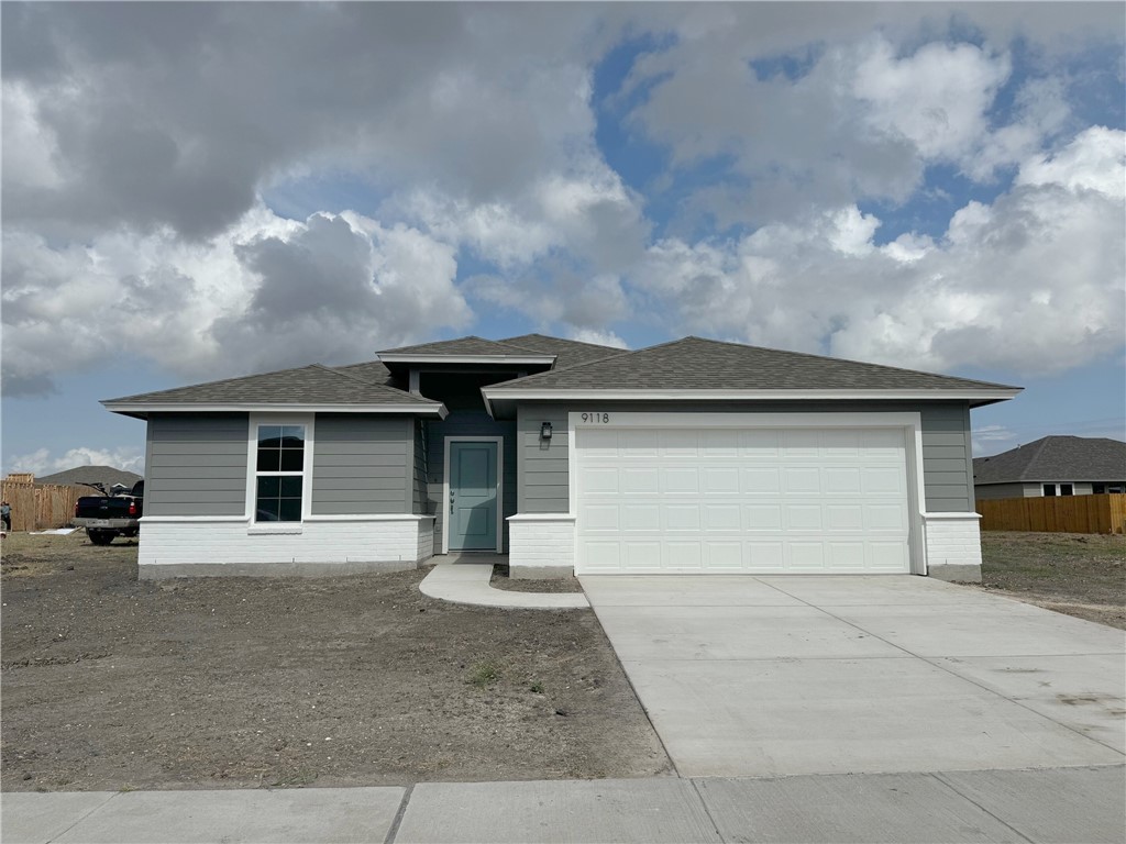 front view of a house with a garage