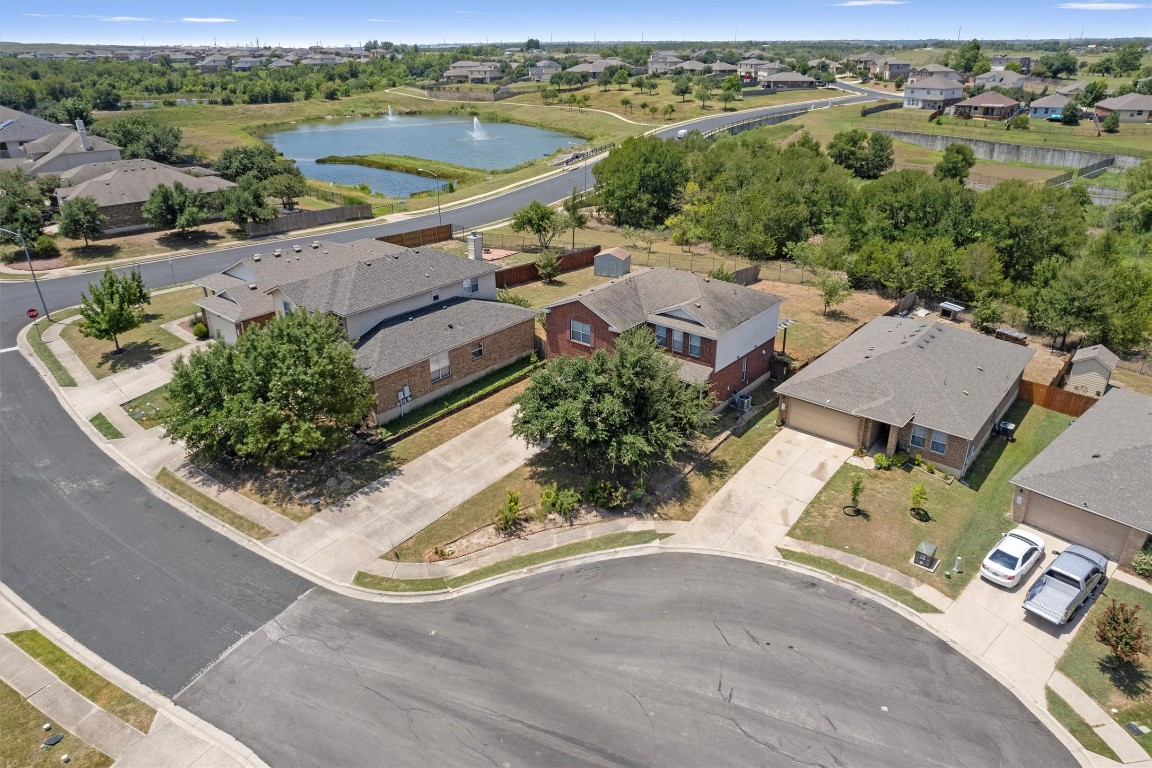 an aerial view of a house with a garden