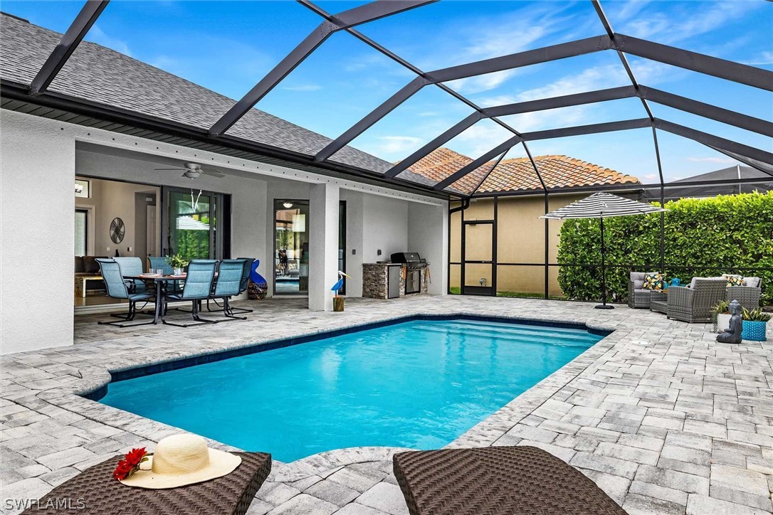 a view of a swimming pool with a patio