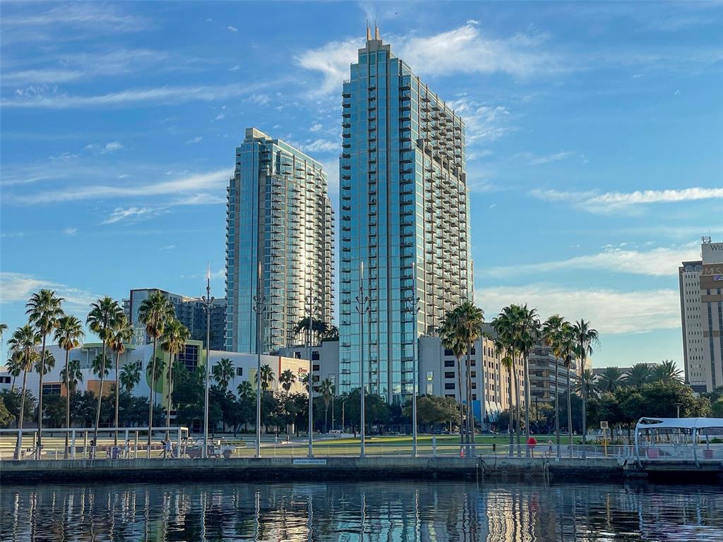 a view of a city with tall buildings