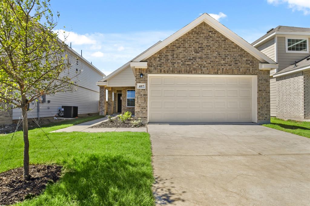 a front view of house with yard barbeque and outdoor seating