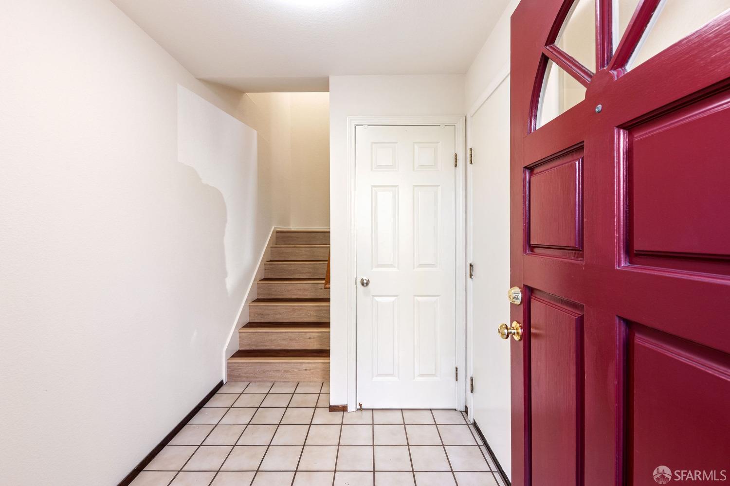 a view of an entryway with staircase