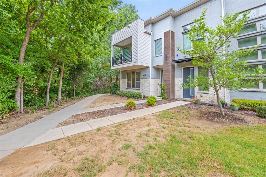 a house with trees in front of it