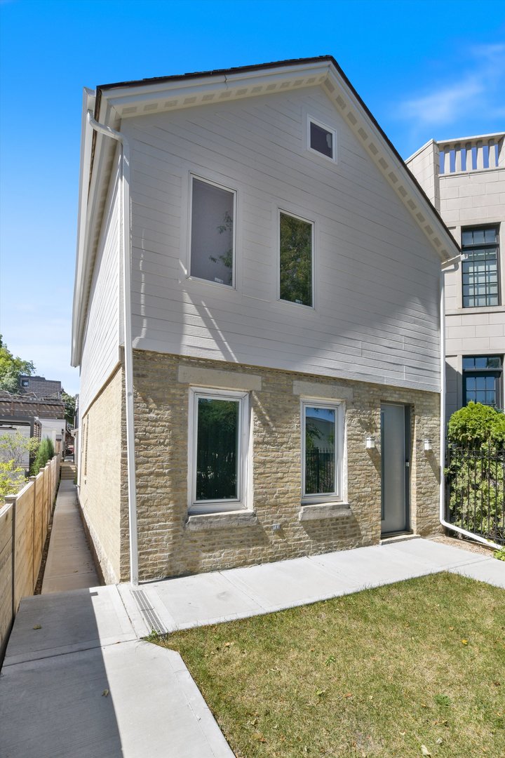 a backyard of a house with seating space