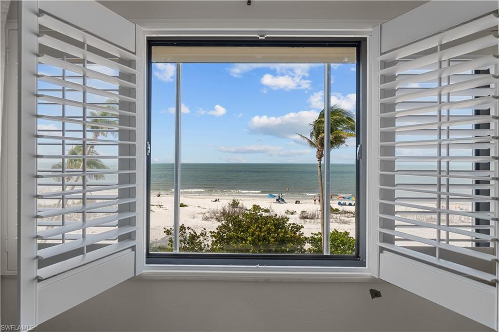 a view of a room that has a window