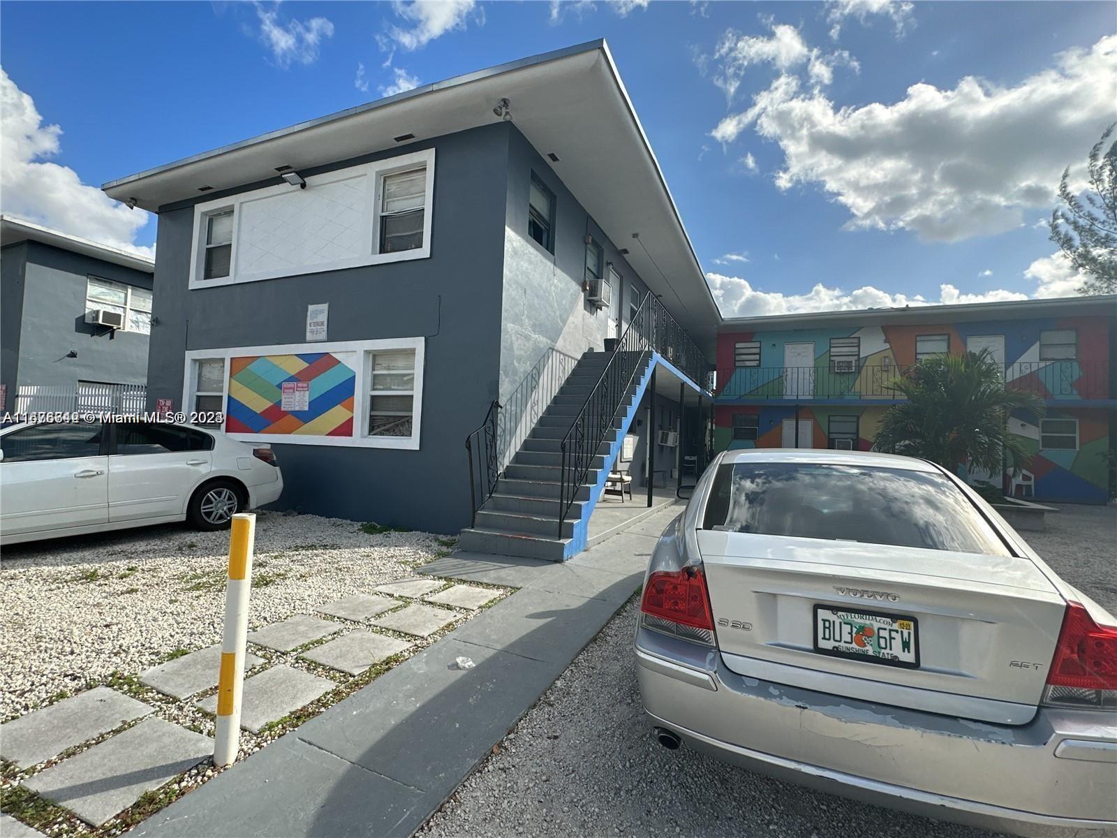 a car parked in front of a house