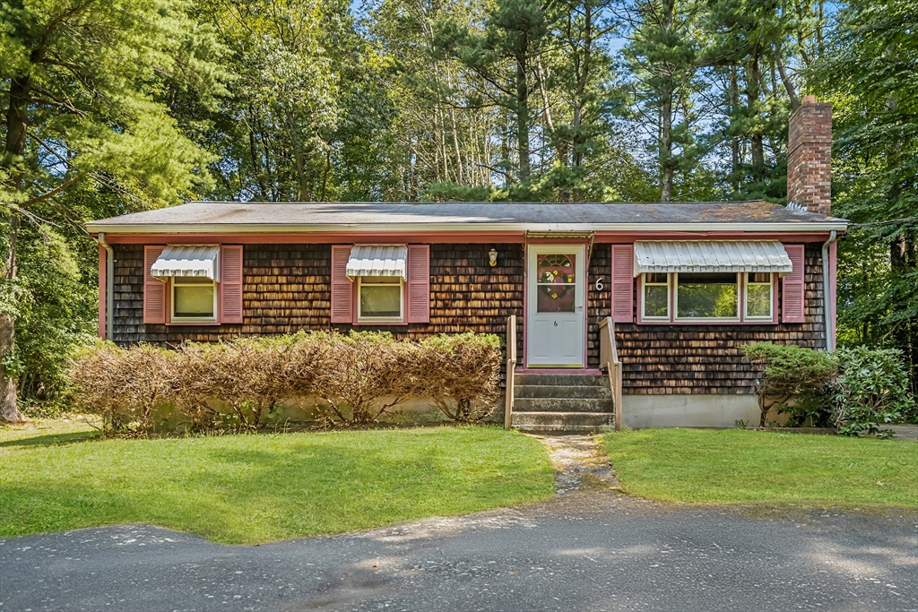 front view of a house and a yard