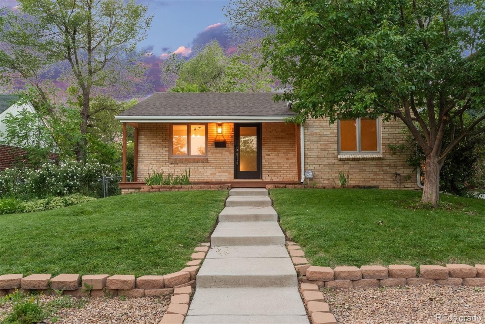 front view of a house with a yard