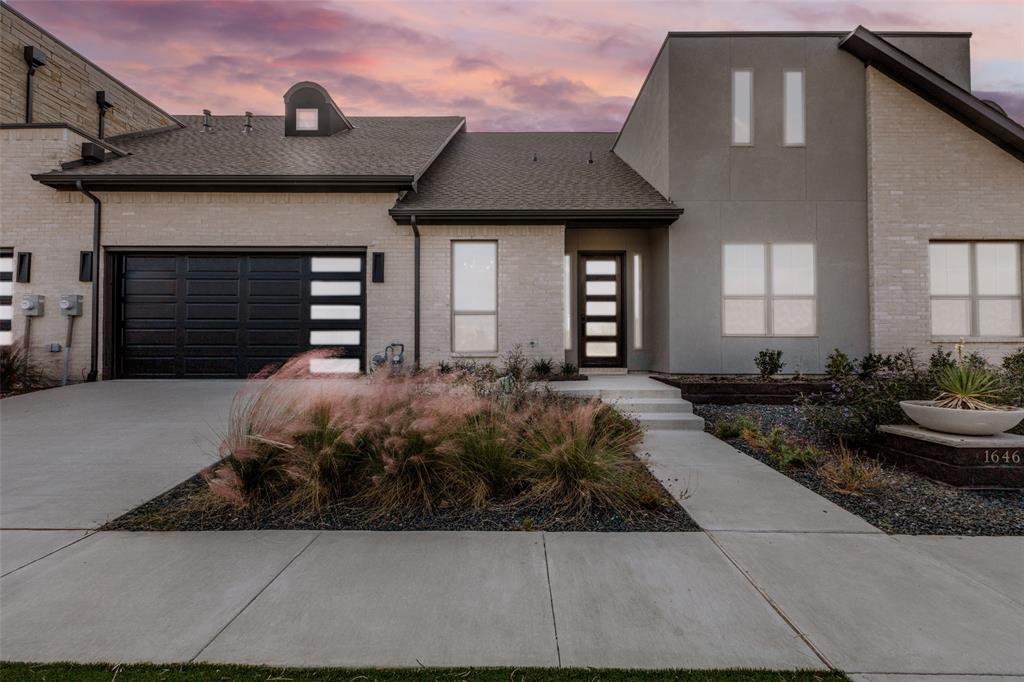 a front view of a house with yard