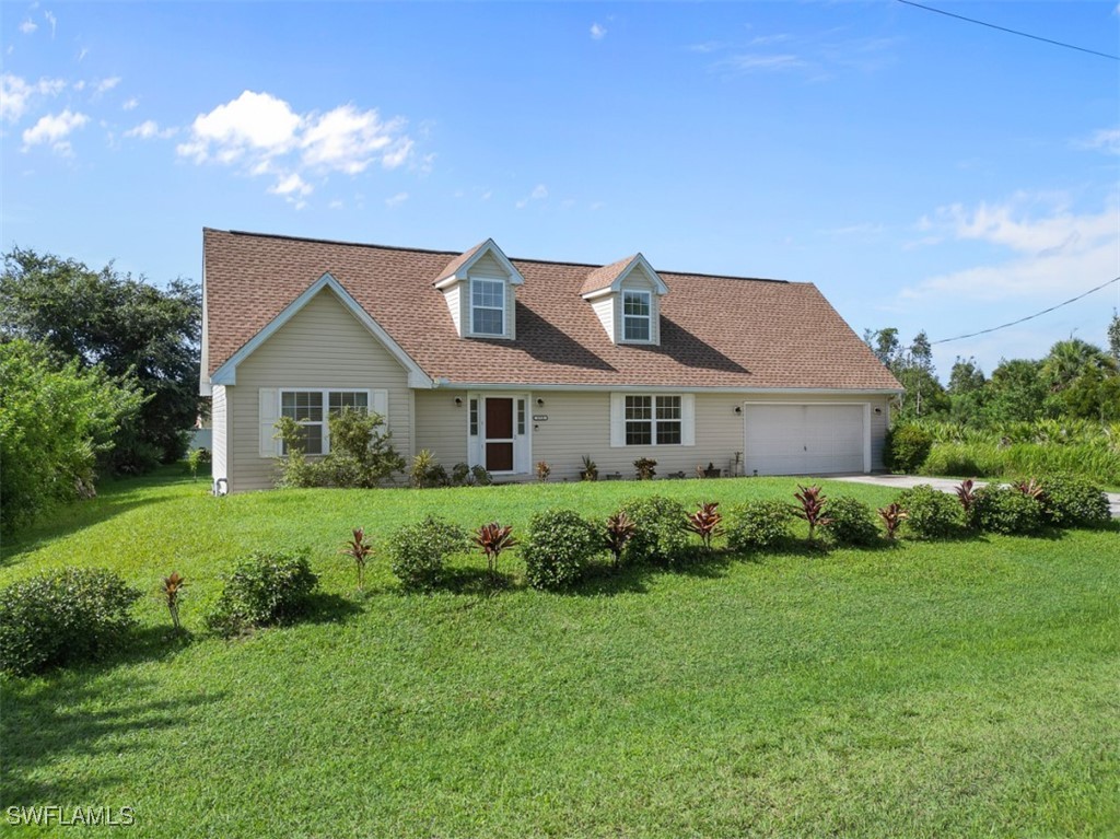 a house view with a garden space