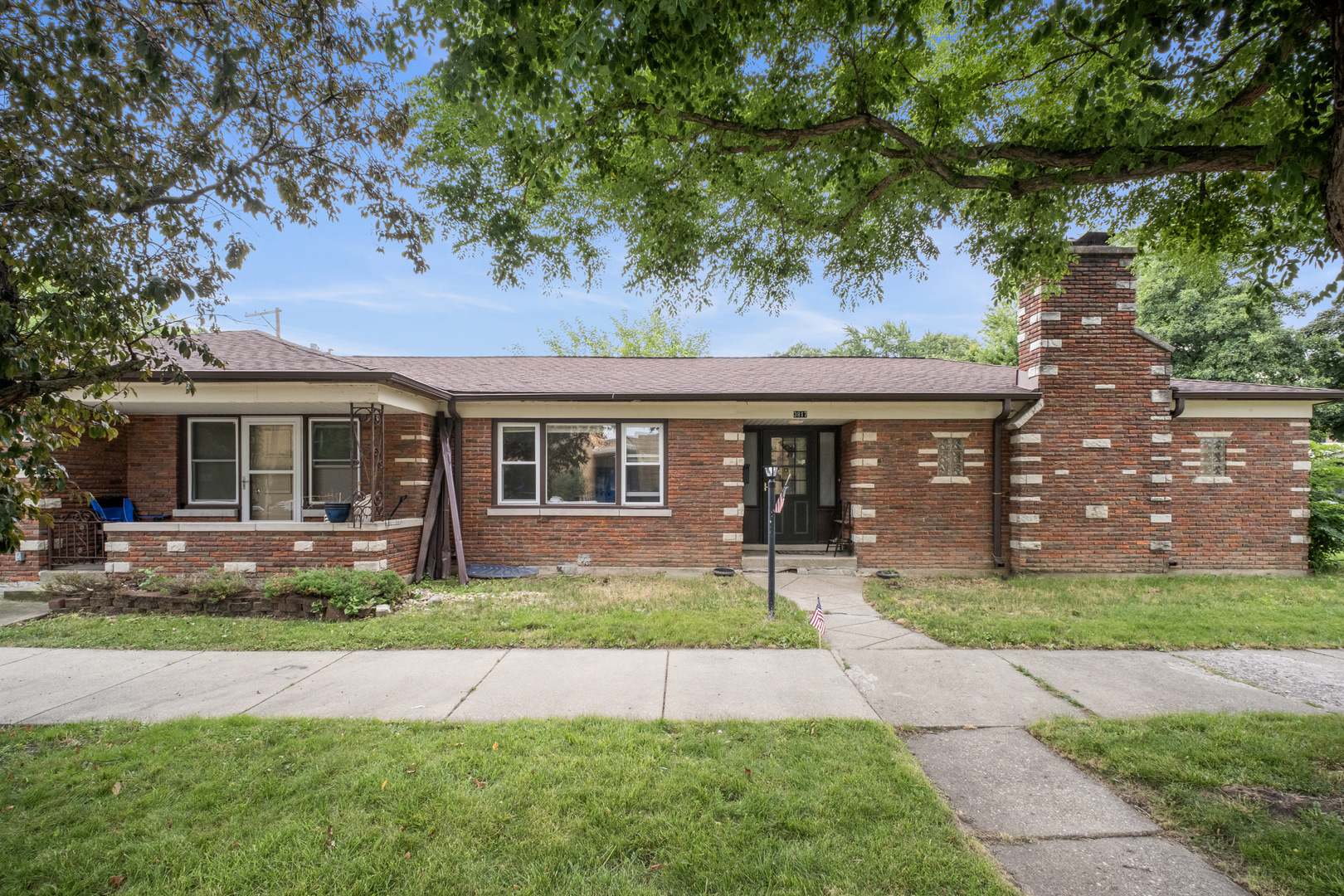 front view of a house with a yard