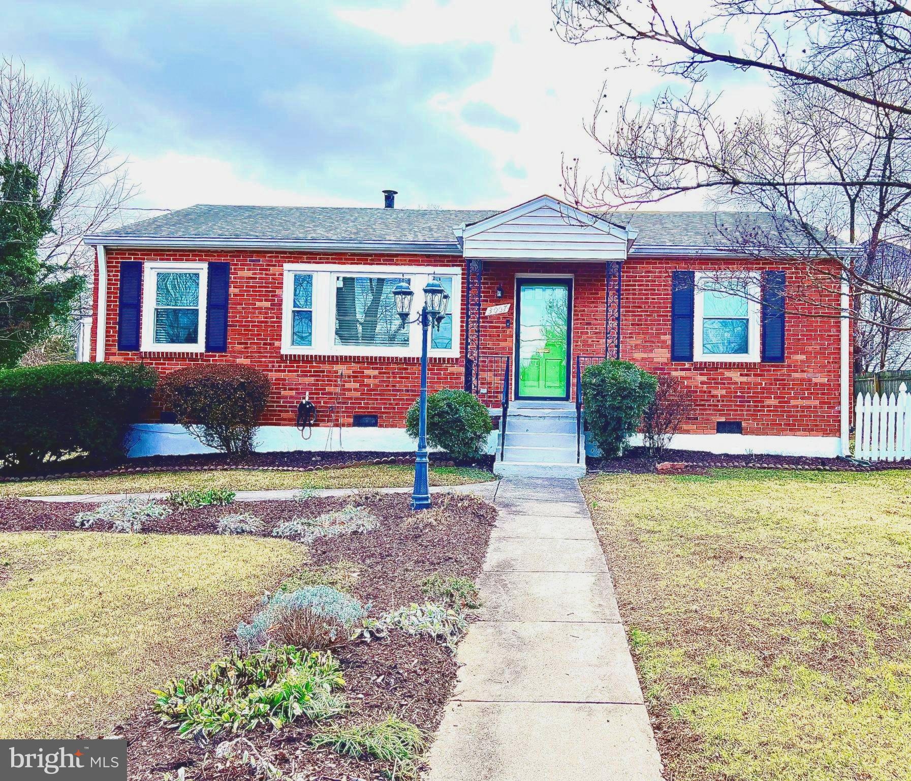 a front view of house with yard