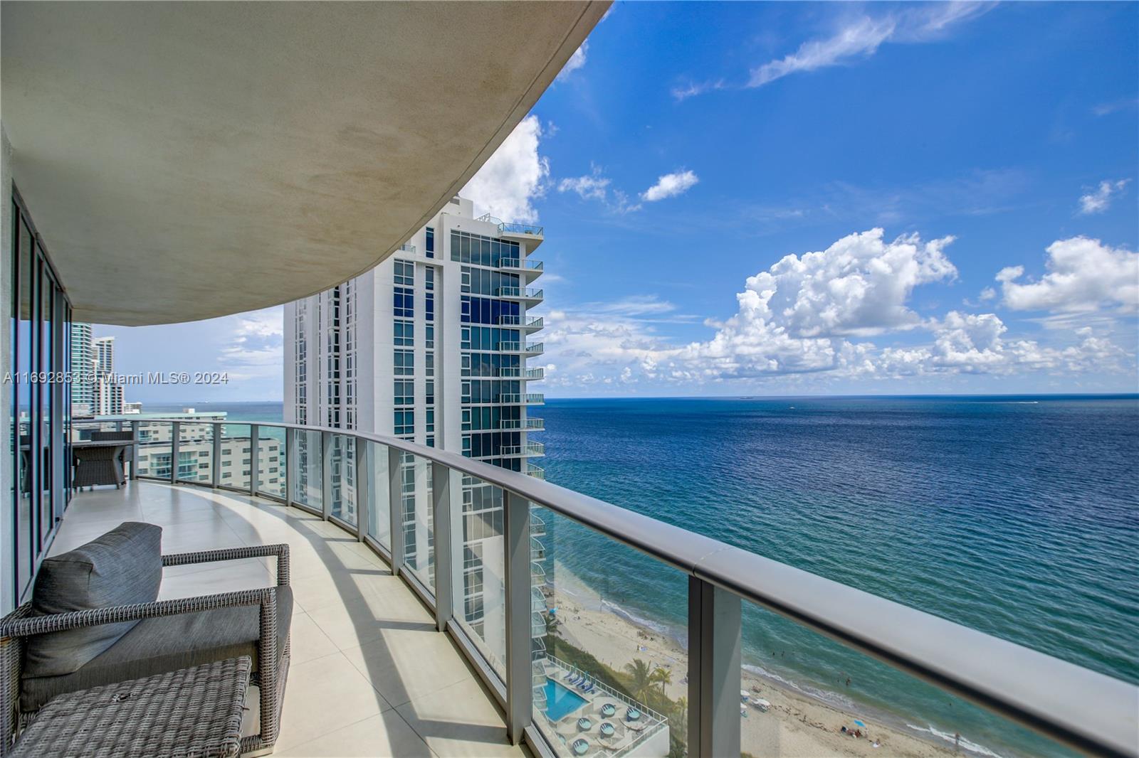 a view of balcony with furniture