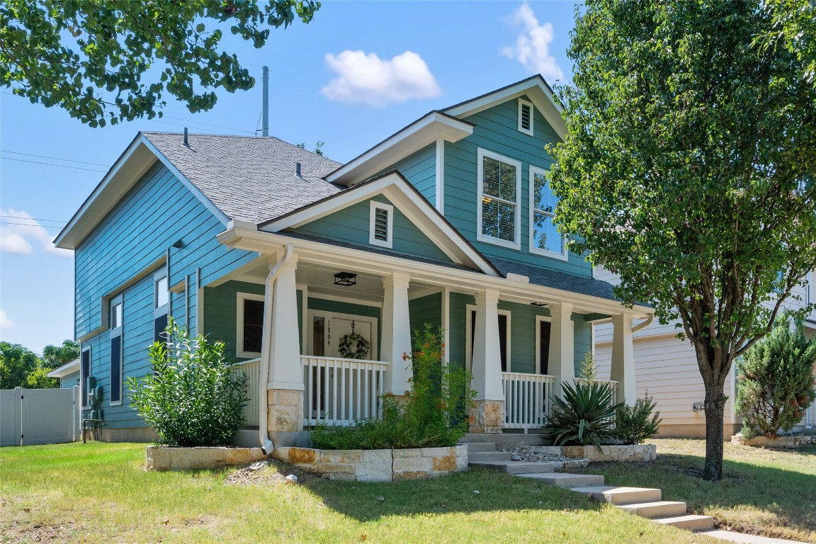 a view of a yard in front of house