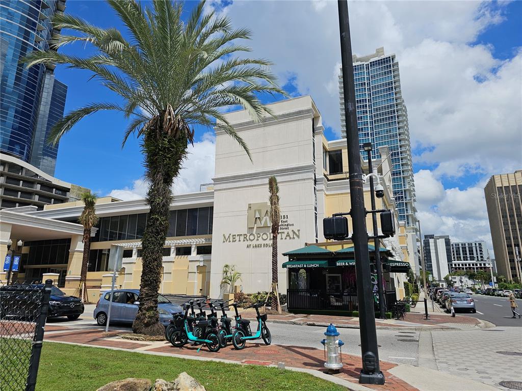 a building with view of the palm trees