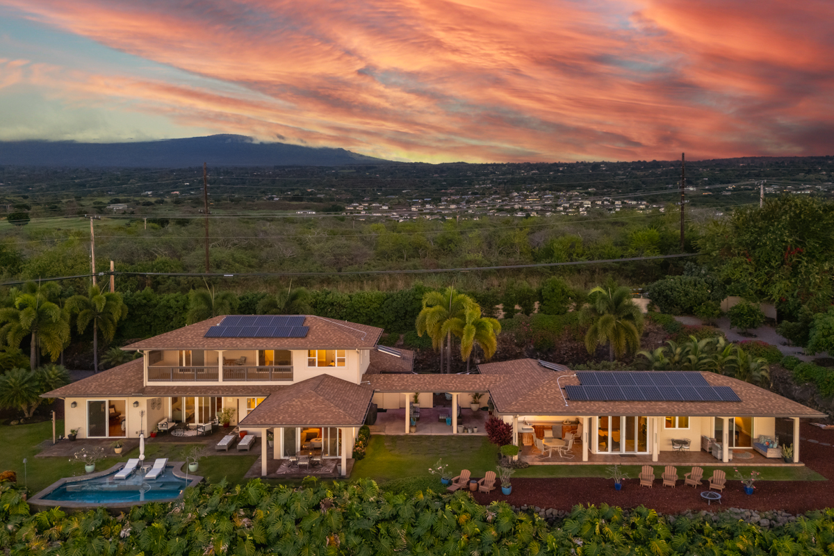 an aerial view of a house with a garden