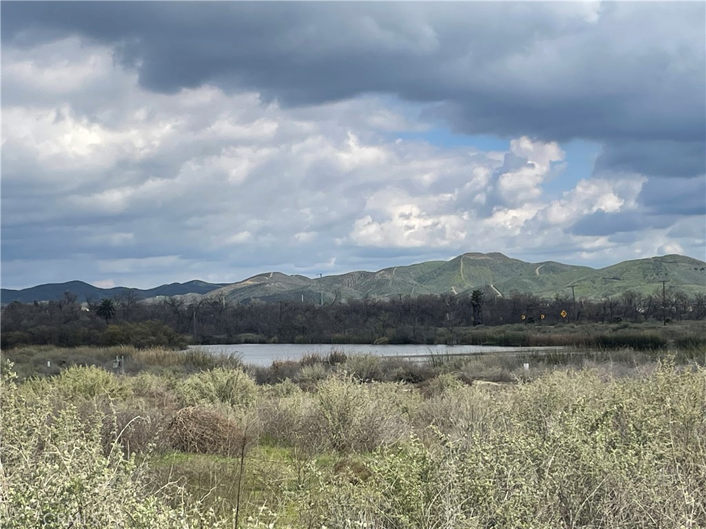 a view of lake with mountain