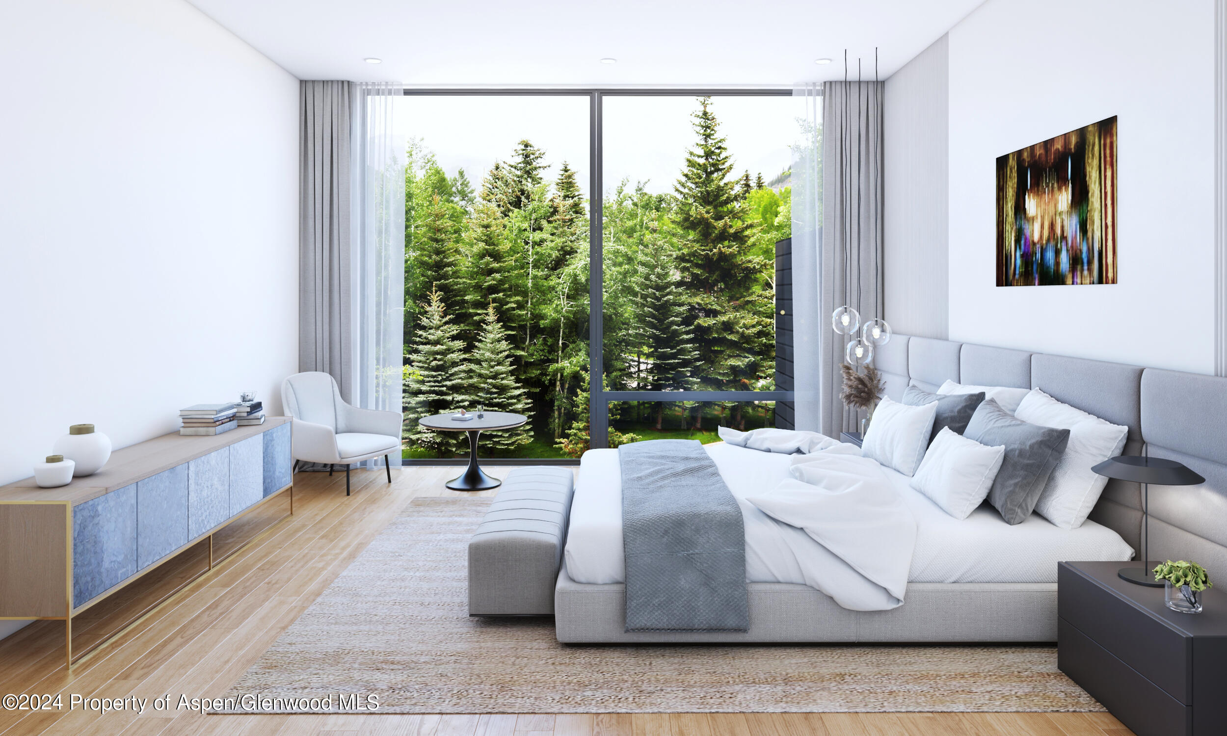 a large white bed sitting in a bedroom next to a window