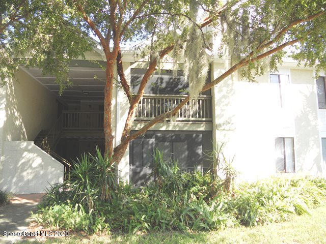 a view of balcony with tree