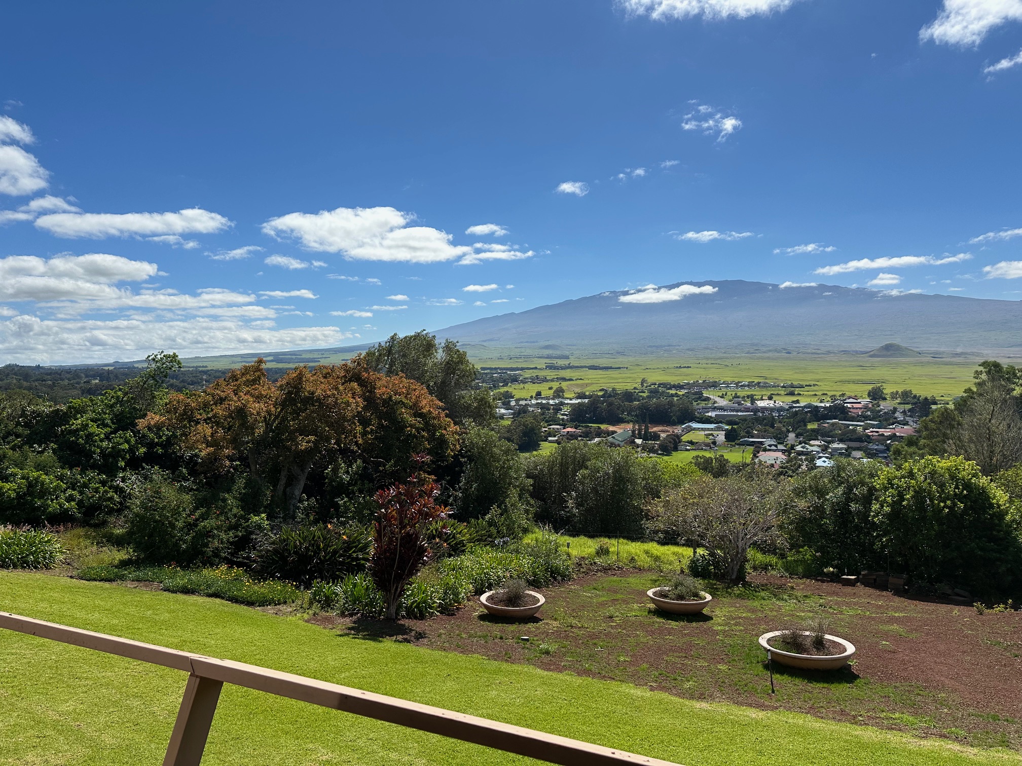 a view of a sink and yard with mountain view