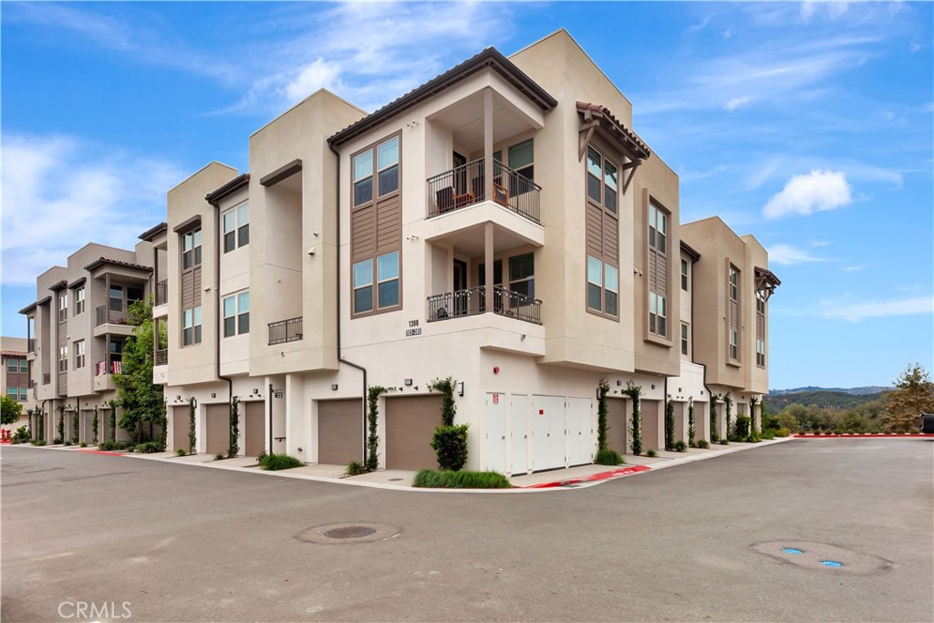 a view of a building with a street