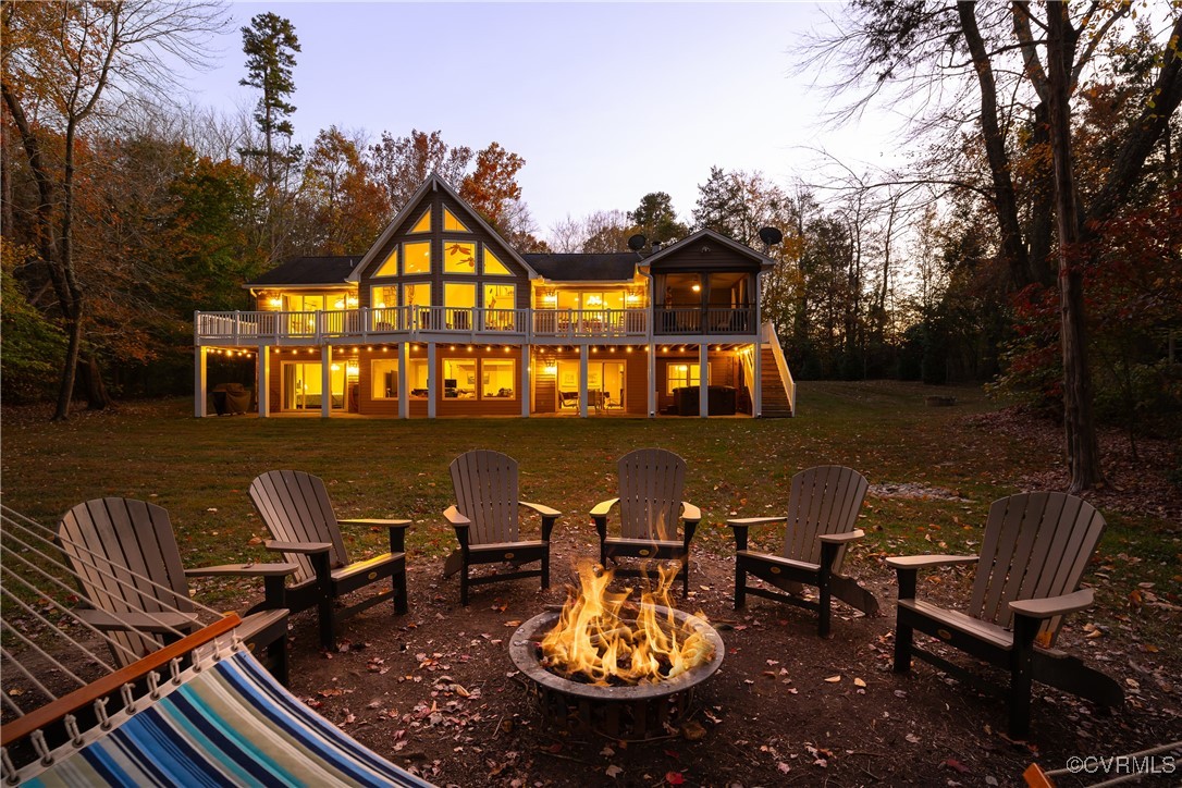 a view of a swimming pool with outdoor seating