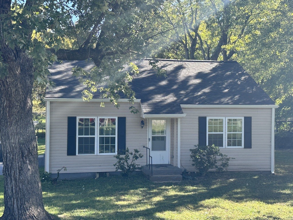 a front view of house with yard