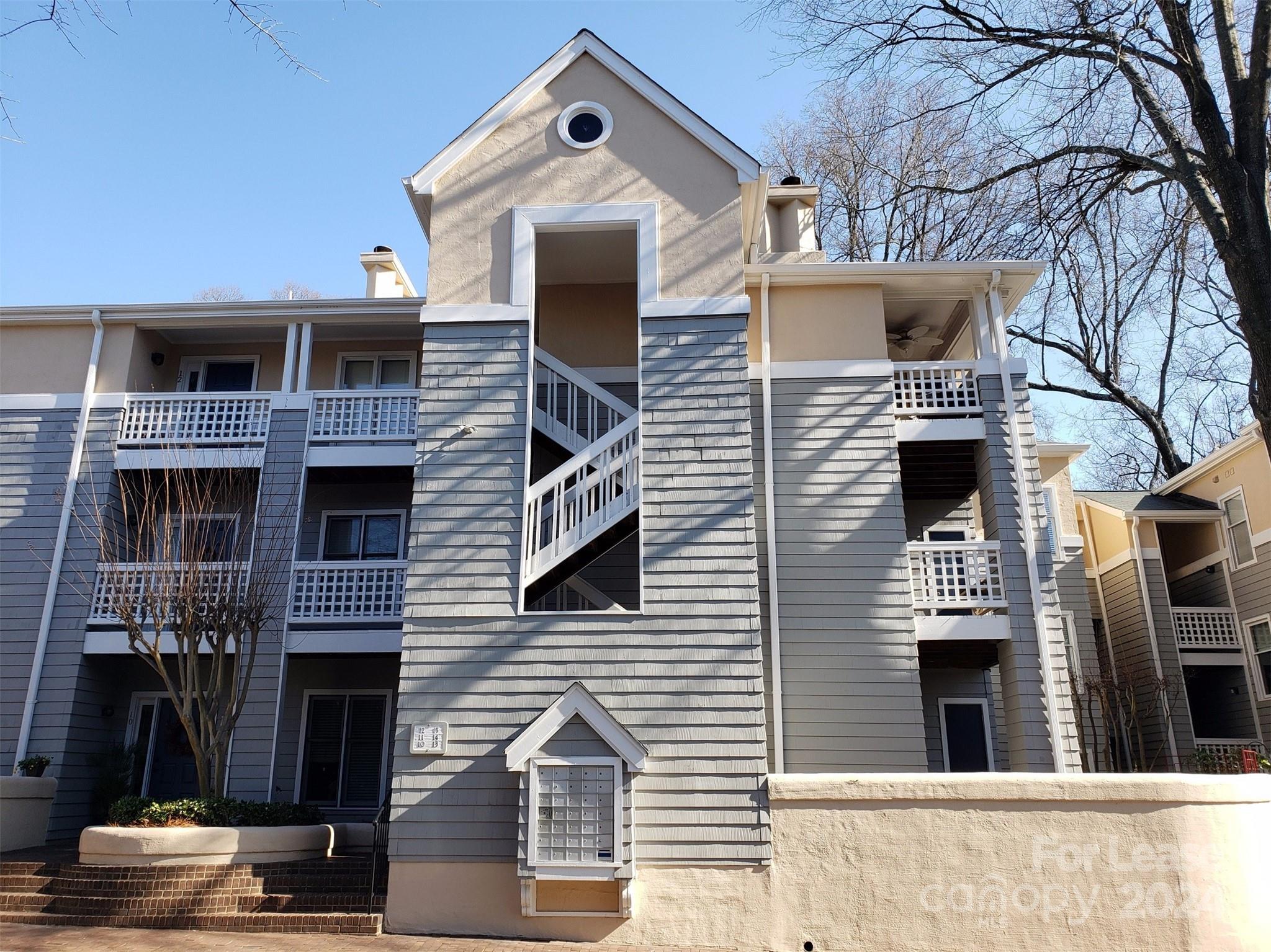 a front view of a house with a balcony